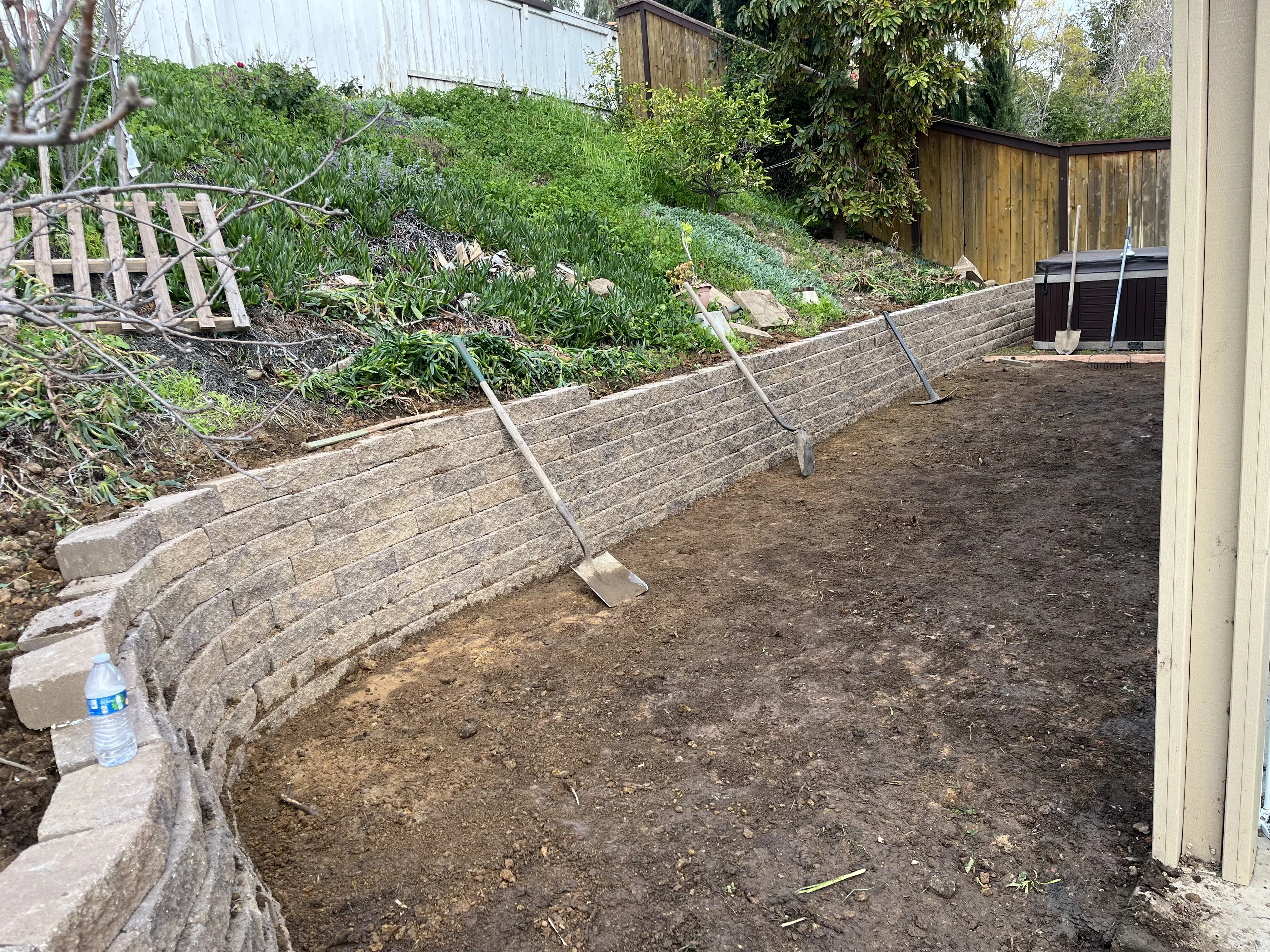 After photo of rebuilt brick retaining wall in Aliso Viejo, CA by Lobato Landscaping