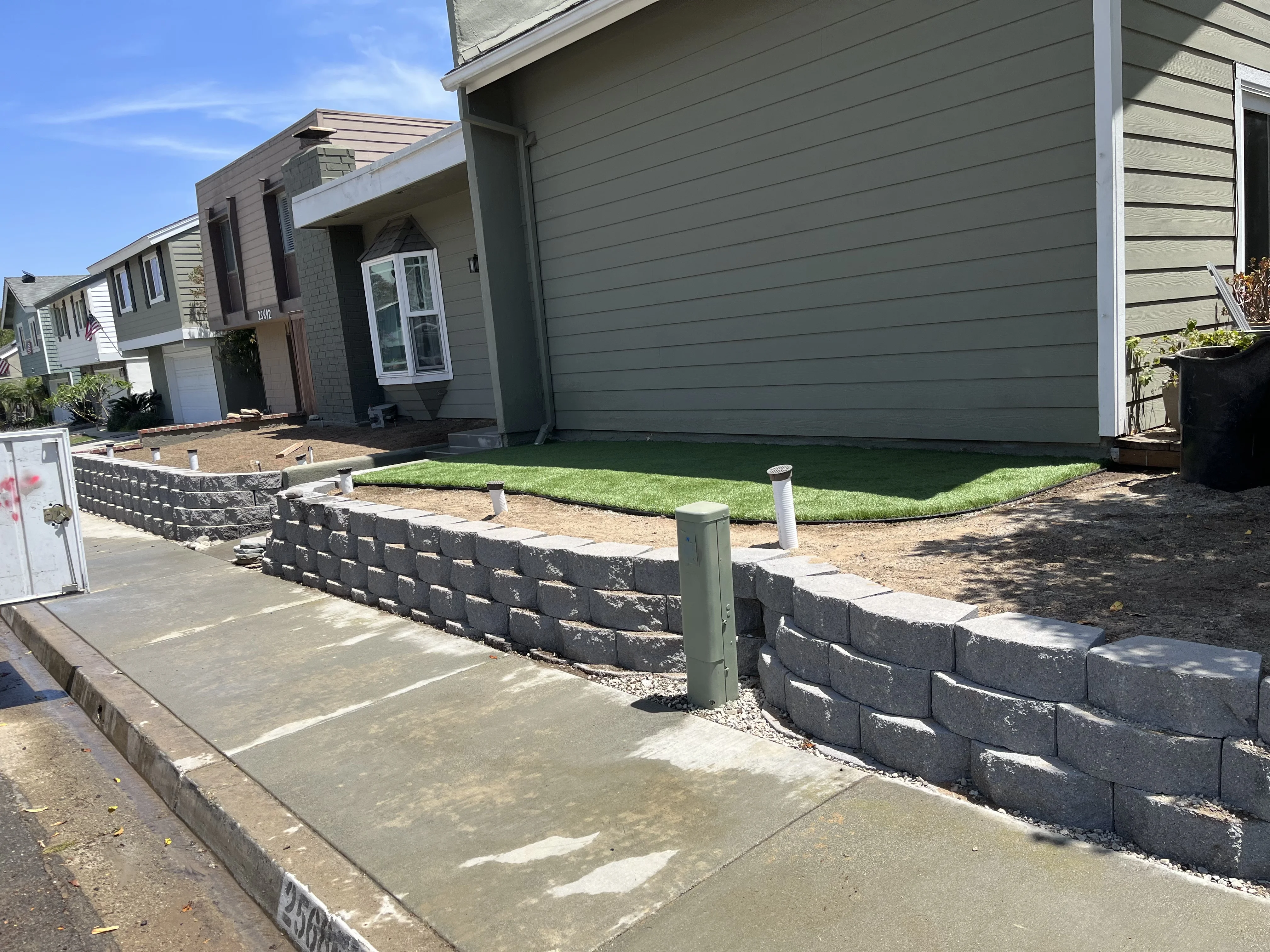 After photo of restored brick retaining wall by Lobato Landscaping in Rancho Mission Viejo, CA