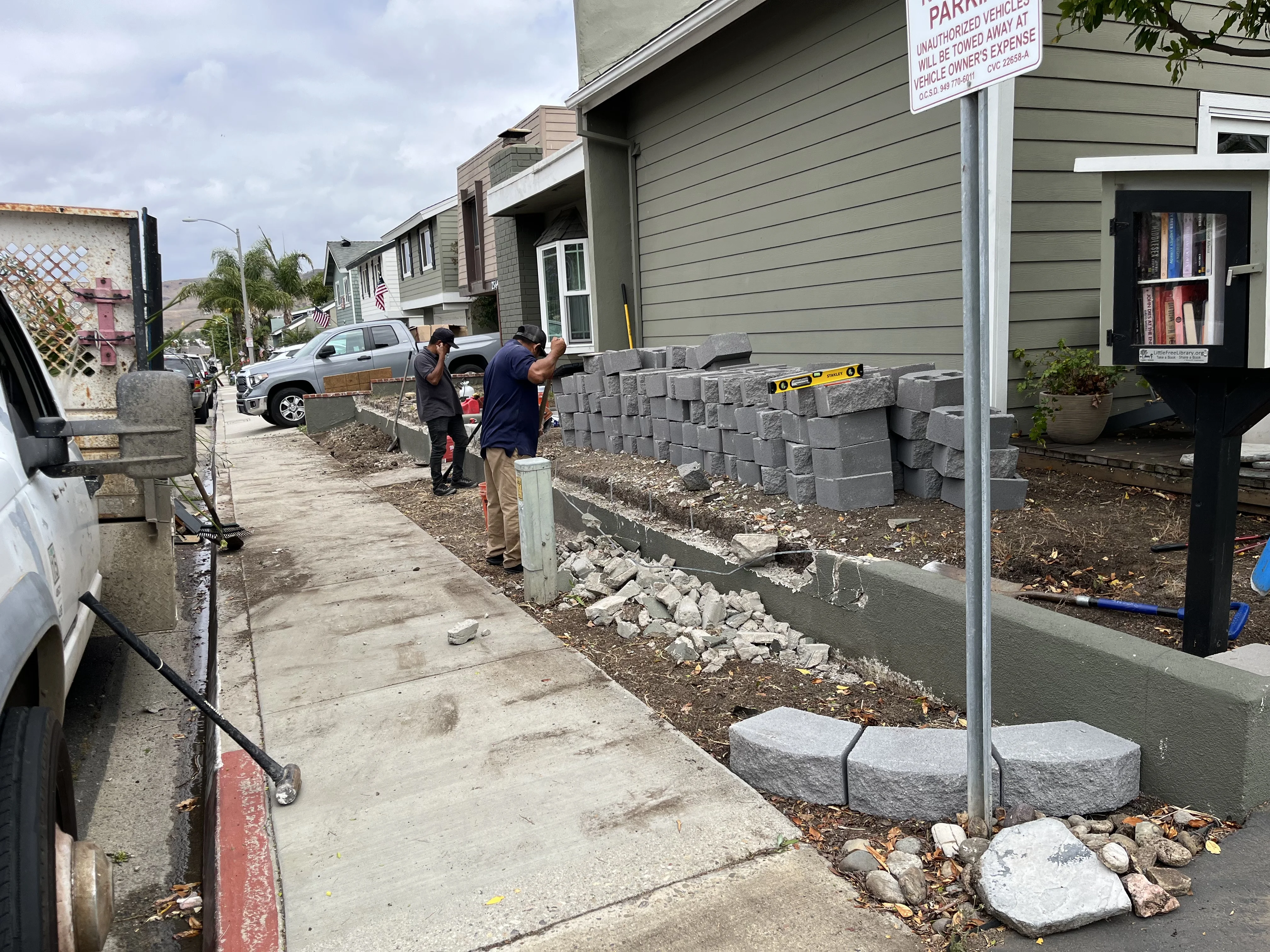 Before photo of damaged brick retaining wall in Rancho Mission Viejo, CA