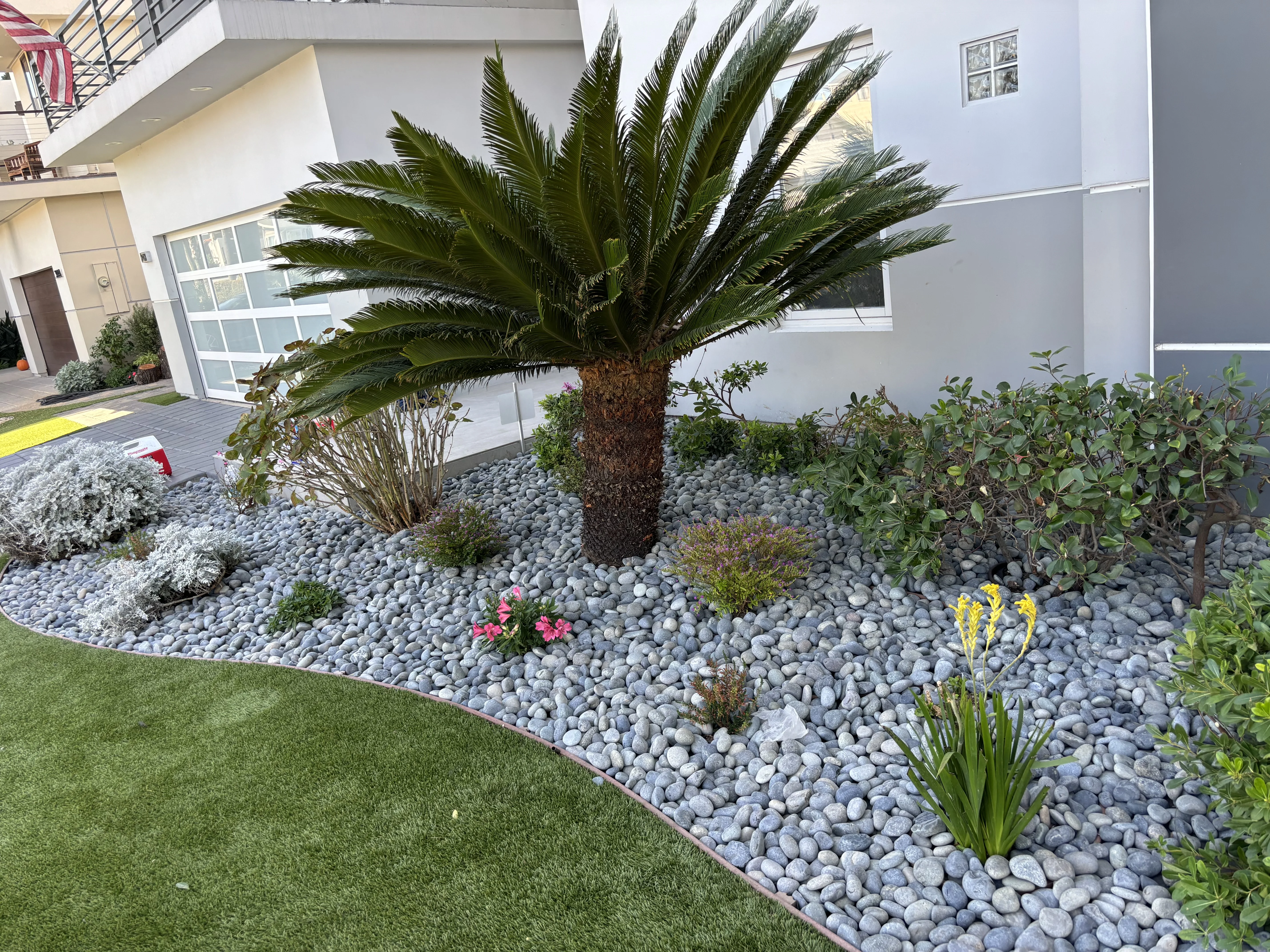 After photo of refreshed rock garden and lawn transformation in Dana Point, CA by Lobato Landscaping