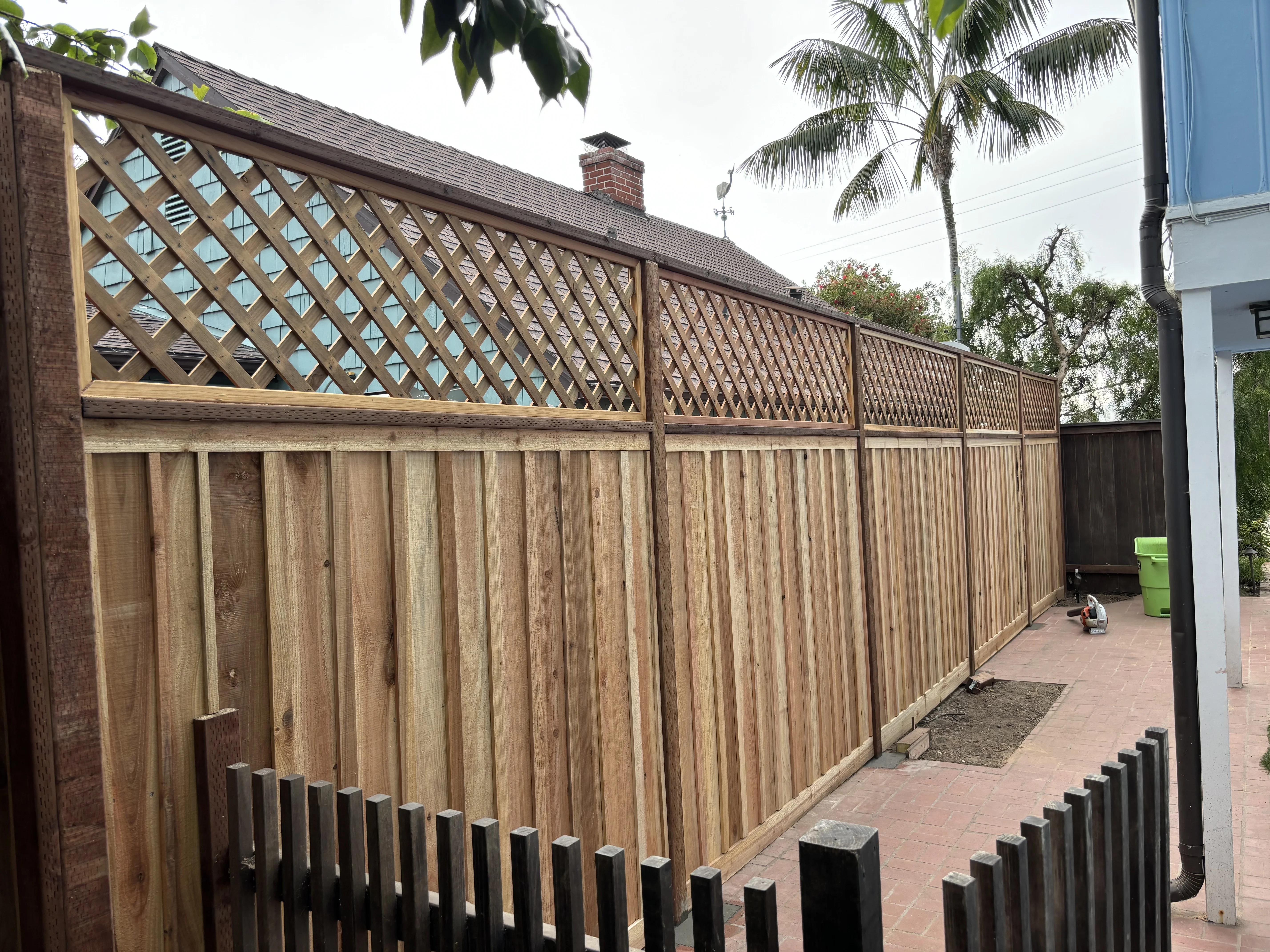 After photo of new cedar wood fence by Lobato Landscaping in Ladera Ranch, CA