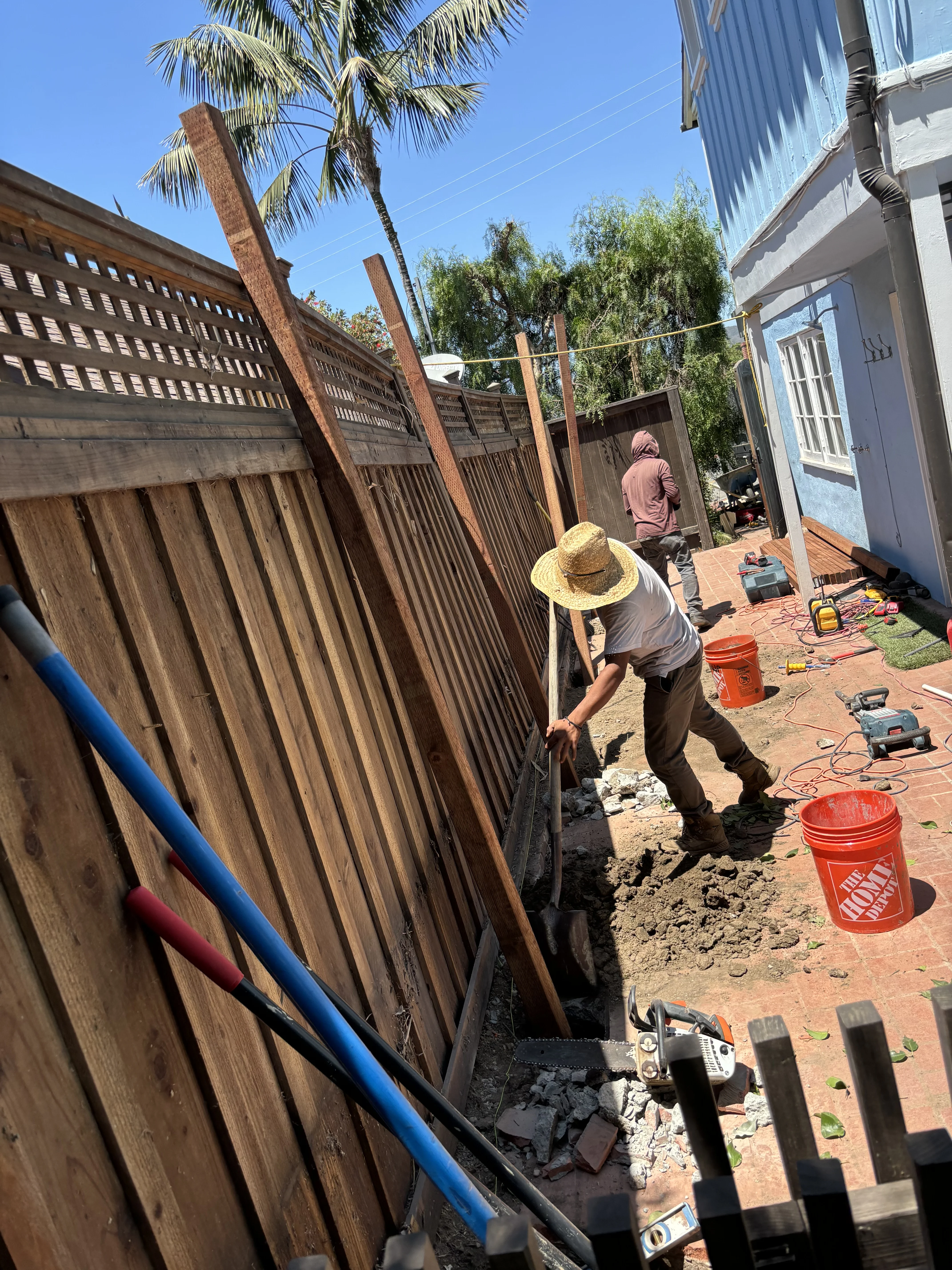 Before photo of old rotting wood fence in Ladera Ranch, CA